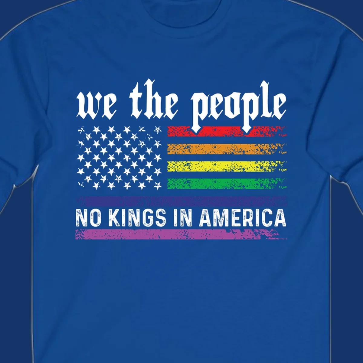 A distressed American flag with rainbow stripes and white stars, featuring 'we the people' and 'NO KINGS IN AMERICA' text.
