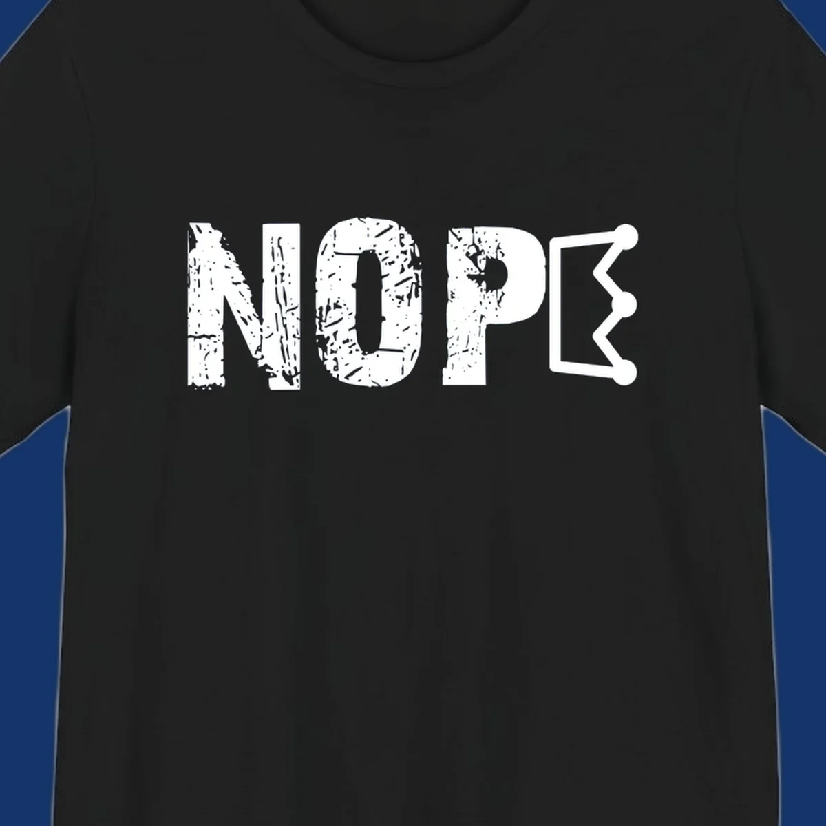 A distressed 'NOPE' text design where the 'E' is a crown outline, clean on all garment colors.