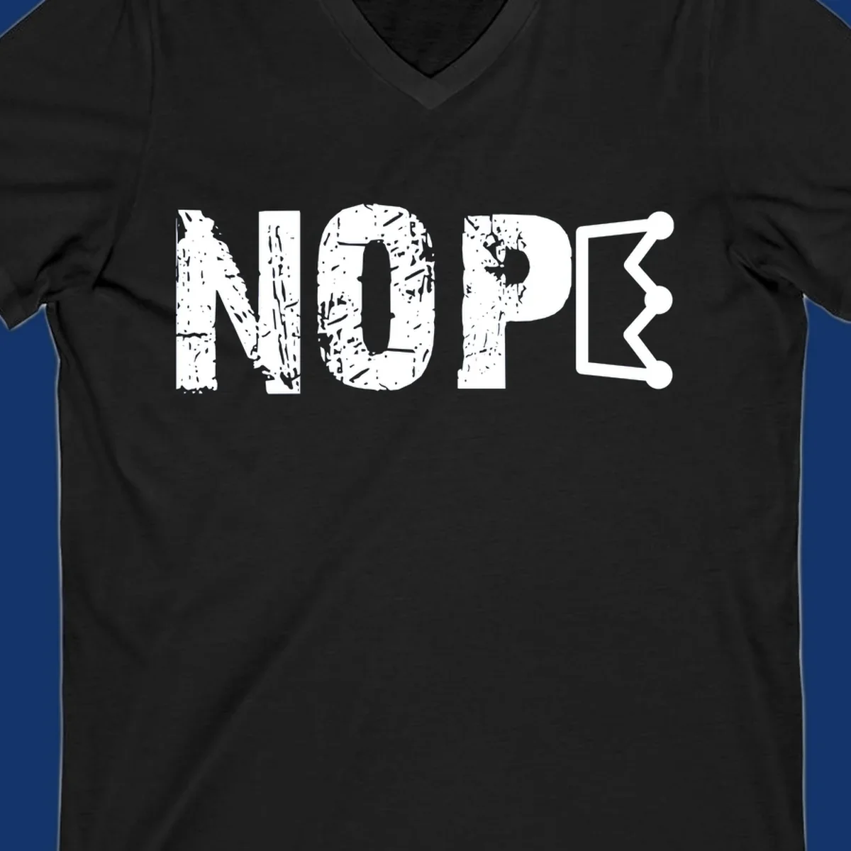 A distressed 'NOPE' text design where the 'E' is a crown outline, clean on all garment colors.