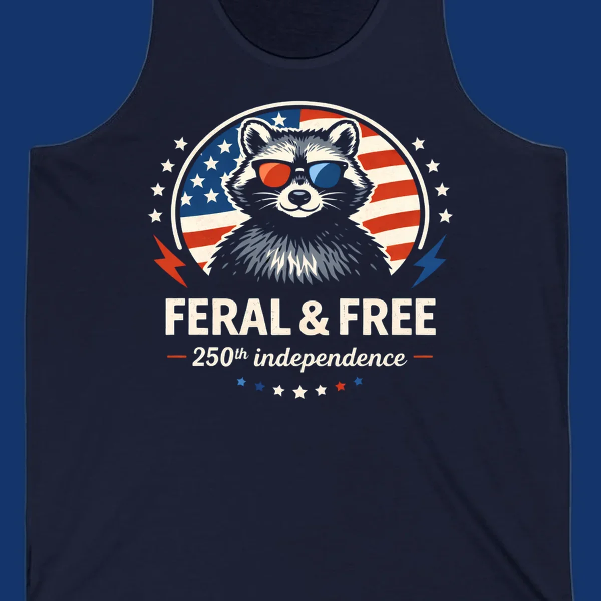 A patriotic design with a raccoon in red and blue sunglasses against an American flag, with text 'Feral & Free 250th Independence'.