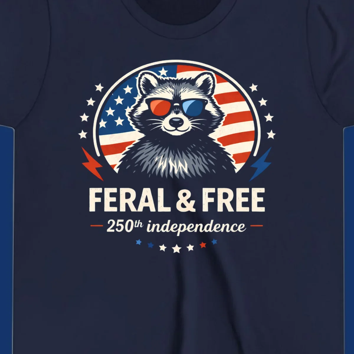 A patriotic design with a raccoon in red and blue sunglasses against an American flag, with text 'Feral & Free 250th Independence'.