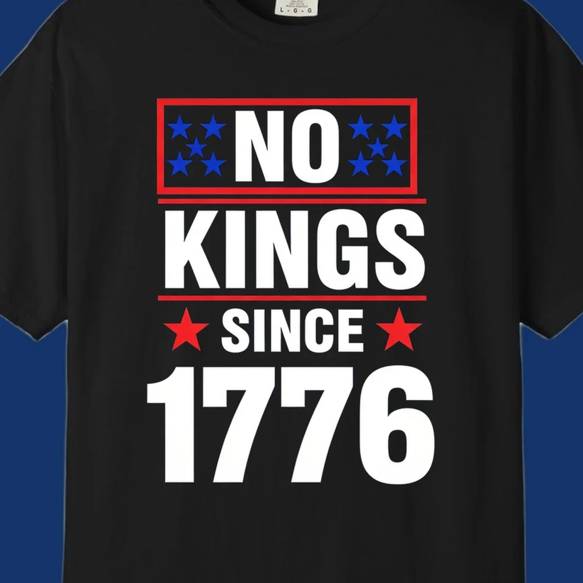 A patriotic design with the text 'NO KINGS SINCE 1776' in white and navy, featuring blue and red stars.