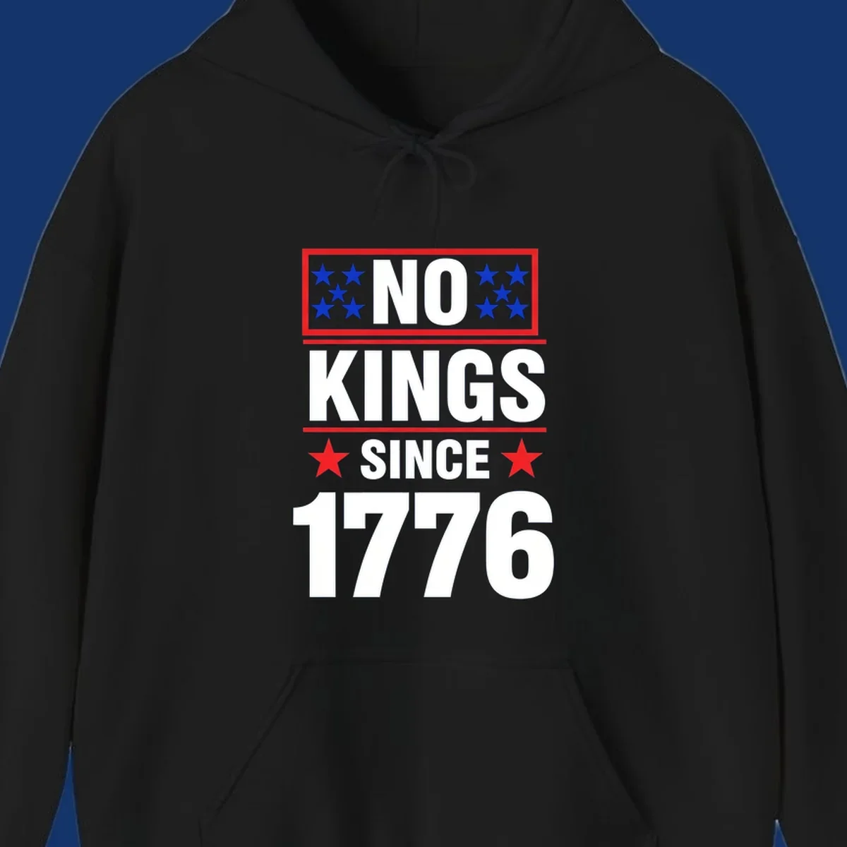 A patriotic design with the text 'NO KINGS SINCE 1776' in white and navy, featuring blue and red stars.