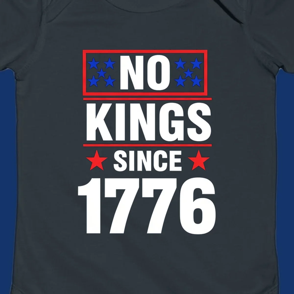 A patriotic design with the text 'NO KINGS SINCE 1776' in white and navy, featuring blue and red stars.