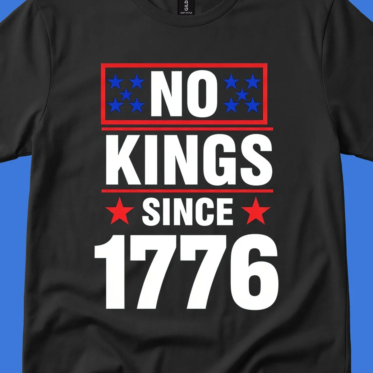 A patriotic design with the text 'NO KINGS SINCE 1776' in white and navy, featuring blue and red stars.