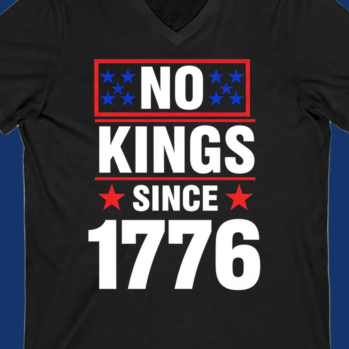 A patriotic design with the text 'NO KINGS SINCE 1776' in white and navy, featuring blue and red stars.
