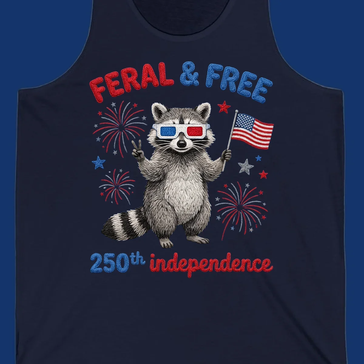 A playful raccoon in 3D glasses holds an American flag, surrounded by fireworks and stars, with "FERAL & FREE 250th independence".