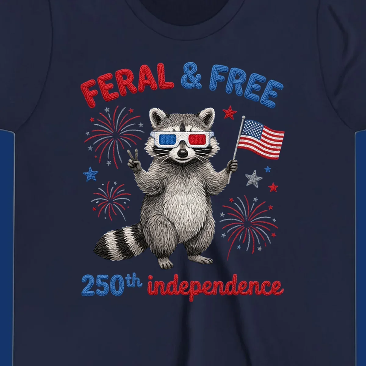 A playful raccoon in 3D glasses holds an American flag, surrounded by fireworks and stars, with "FERAL & FREE 250th independence".