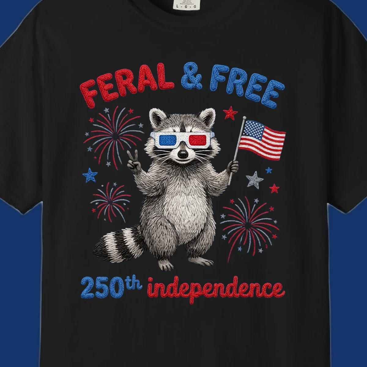 A "FERAL & FREE" raccoon in 3D glasses holds an American flag, surrounded by fireworks, celebrating 250th independence.