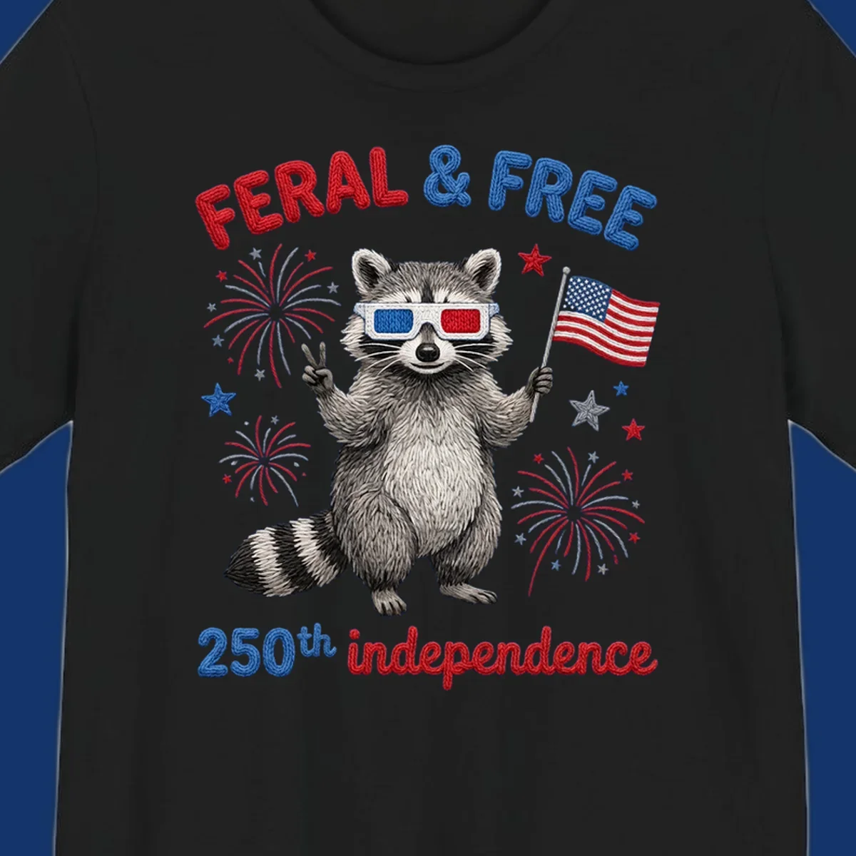 A "FERAL & FREE" raccoon in 3D glasses holds an American flag, surrounded by fireworks, celebrating 250th independence.