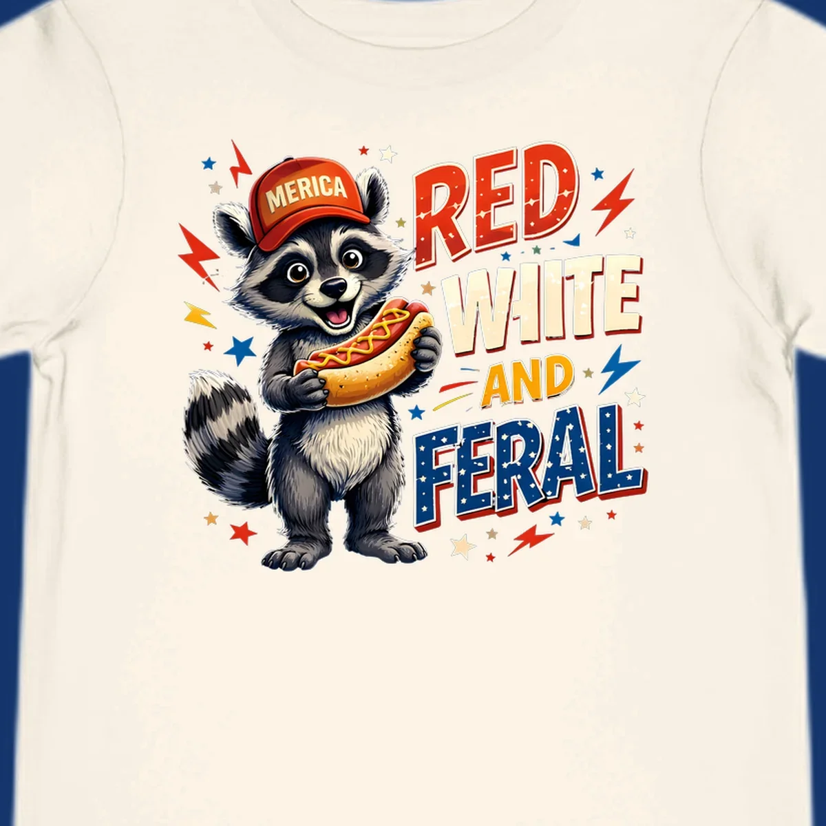 A happy raccoon in a 'MERICA' hat holds a hot dog, with 'RED WHITE AND FERAL' text, stars, and lightning bolts. Features a raccoon-merica-feral-hotdog theme.