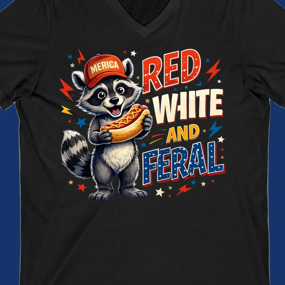 A happy raccoon in a 'MERICA' hat holds a hot dog, with 'RED WHITE AND FERAL' text, stars, and lightning bolts. Features a raccoon-merica-feral-hotdog theme.