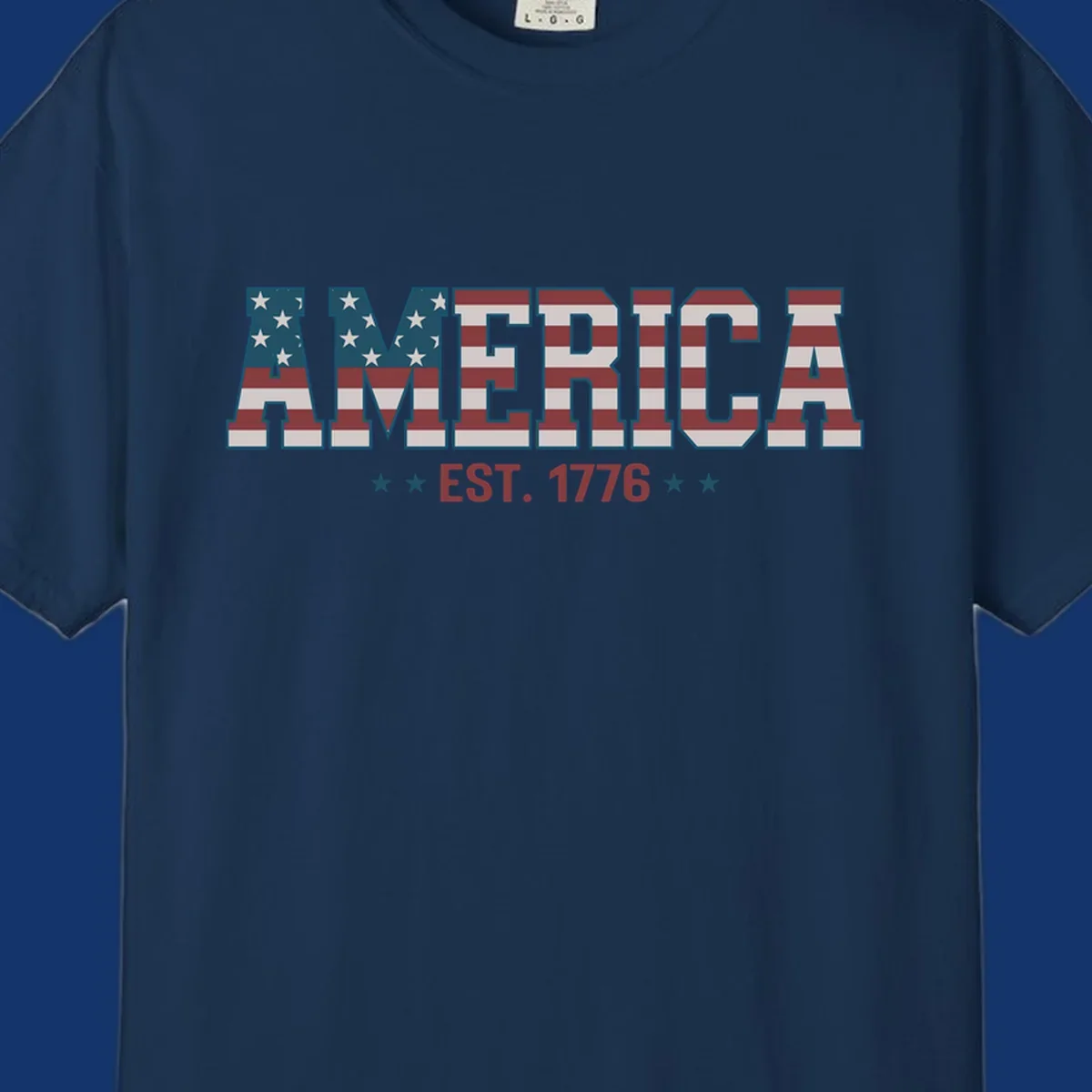 The word AMERICA in block letters, filled with an American flag pattern, above the text EST. 1776 with stars. Concept: america-est-1776-flag.