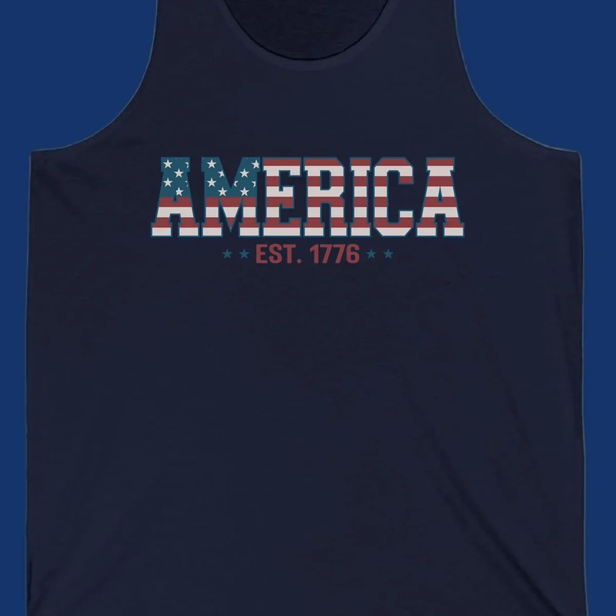 The word AMERICA in block letters, filled with an American flag pattern, above the text EST. 1776 with stars. Concept: america-est-1776-flag.