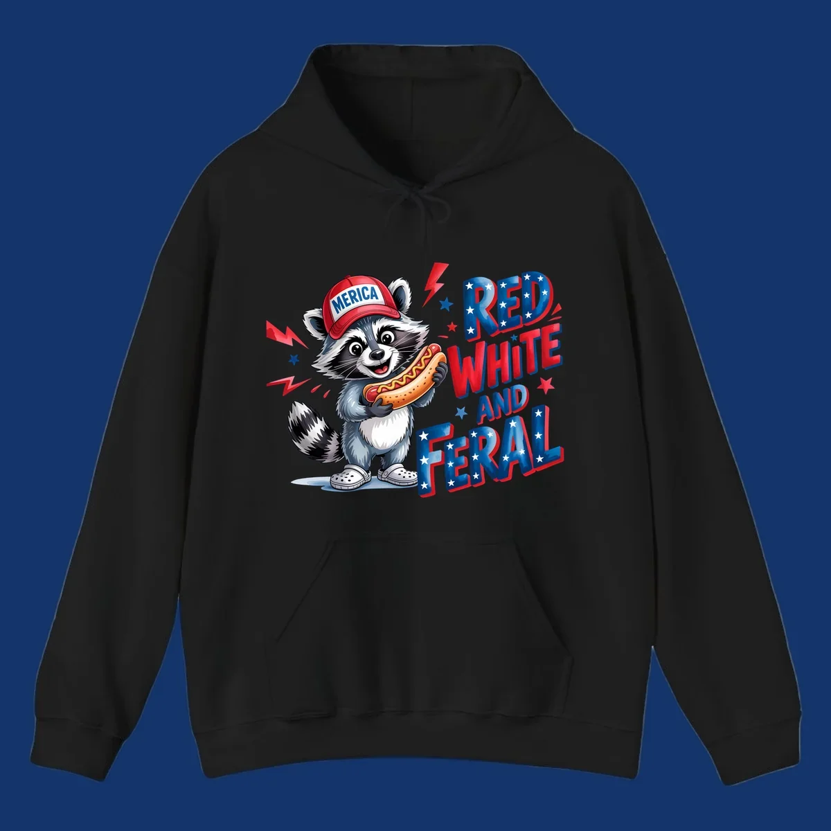 A cartoon raccoon wearing a 'MERICA' hat and holding a hot dog, next to text 'RED WHITE AND FERAL'. This is a raccoon-red-white-feral design.