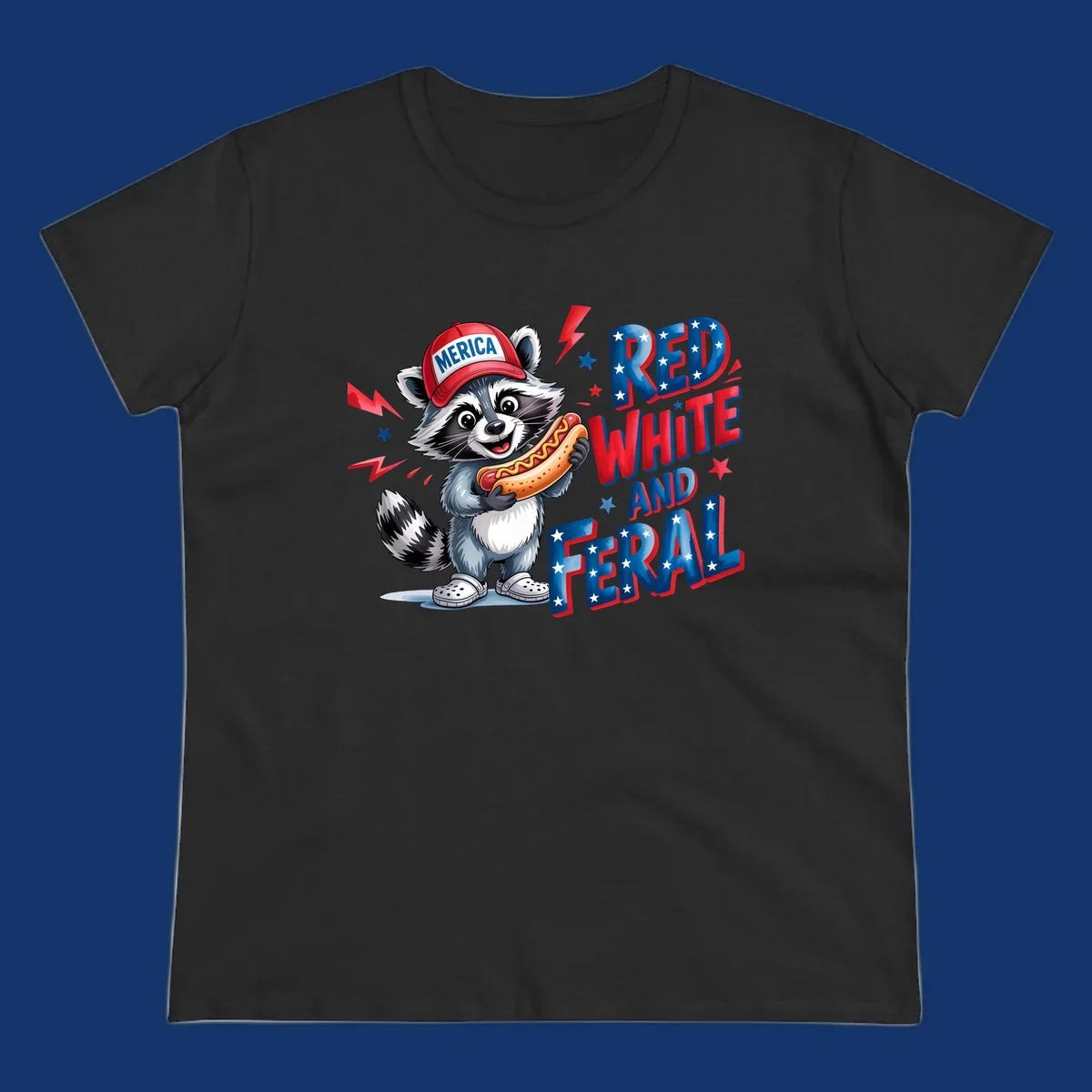 A cartoon raccoon wearing a 'MERICA' hat and holding a hot dog, next to text 'RED WHITE AND FERAL'. This is a raccoon-red-white-feral design.