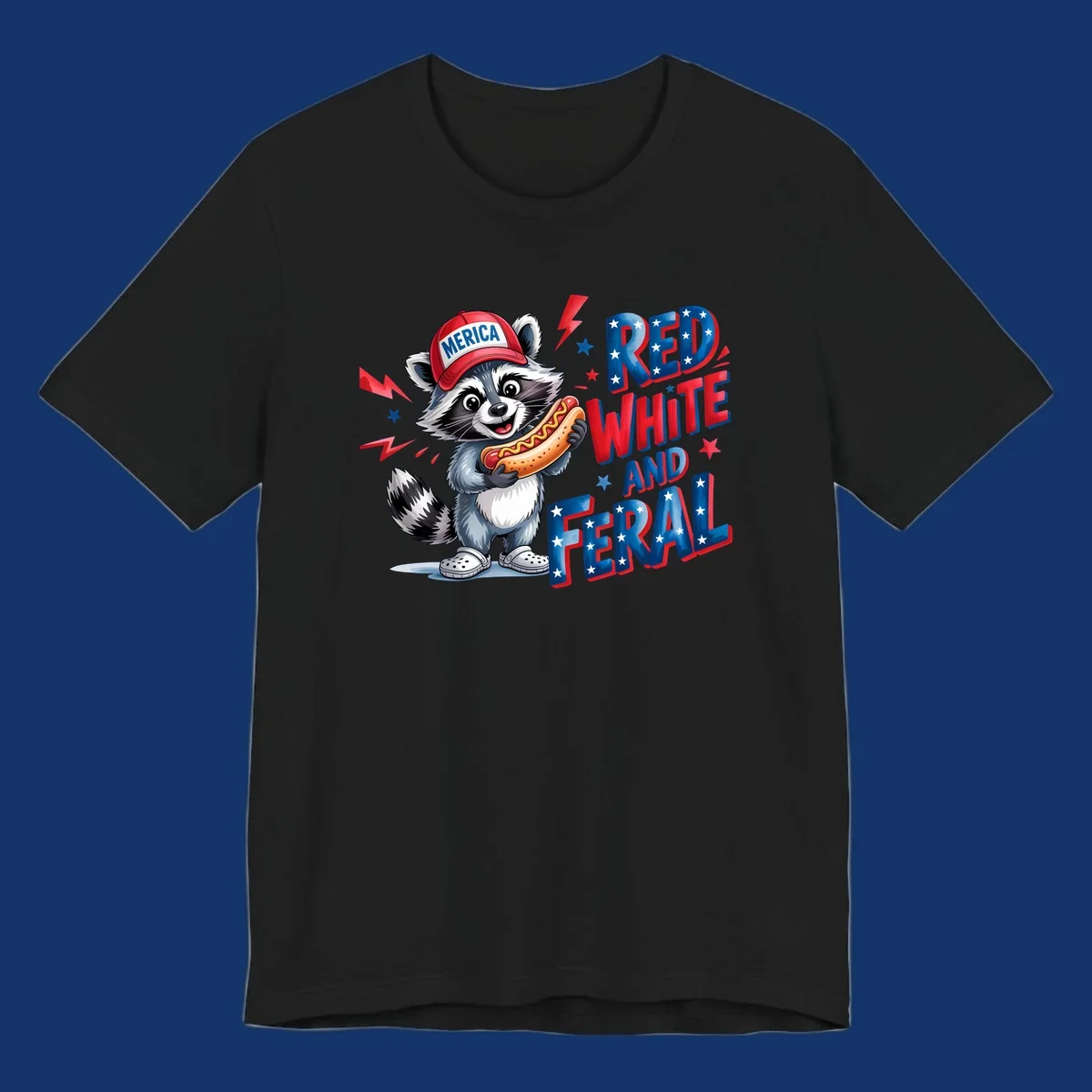 A cartoon raccoon wearing a 'MERICA' hat and holding a hot dog, next to text 'RED WHITE AND FERAL'. This is a raccoon-red-white-feral design.