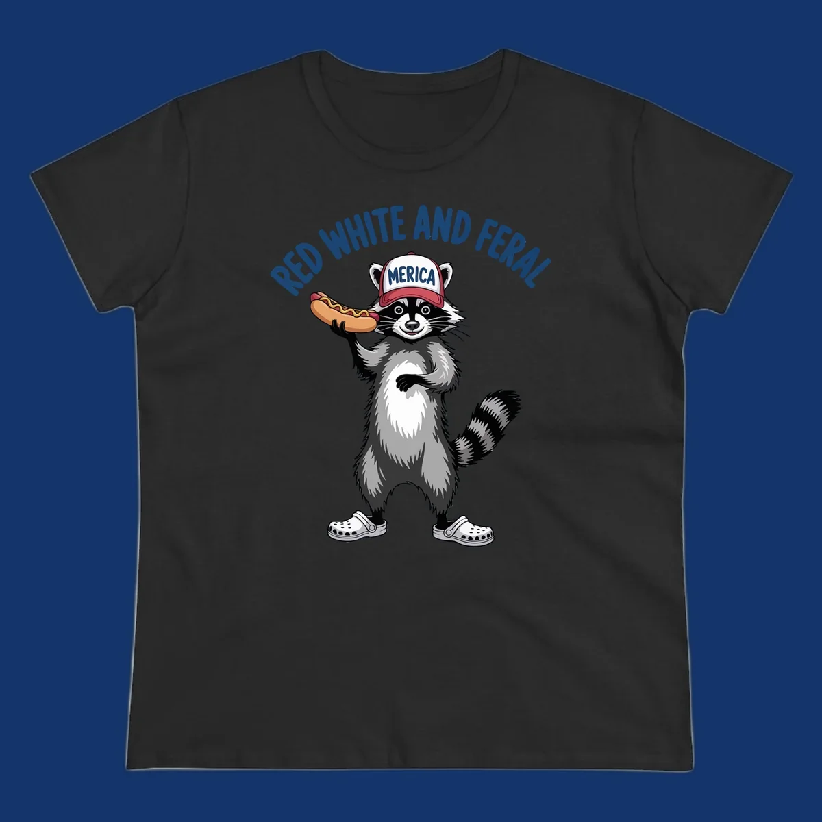 A patriotic raccoon in a MERICA hat and Crocs holds a hot dog, with 'RED WHITE AND FERAL' text. Features the red-white-feral-raccoon concept.