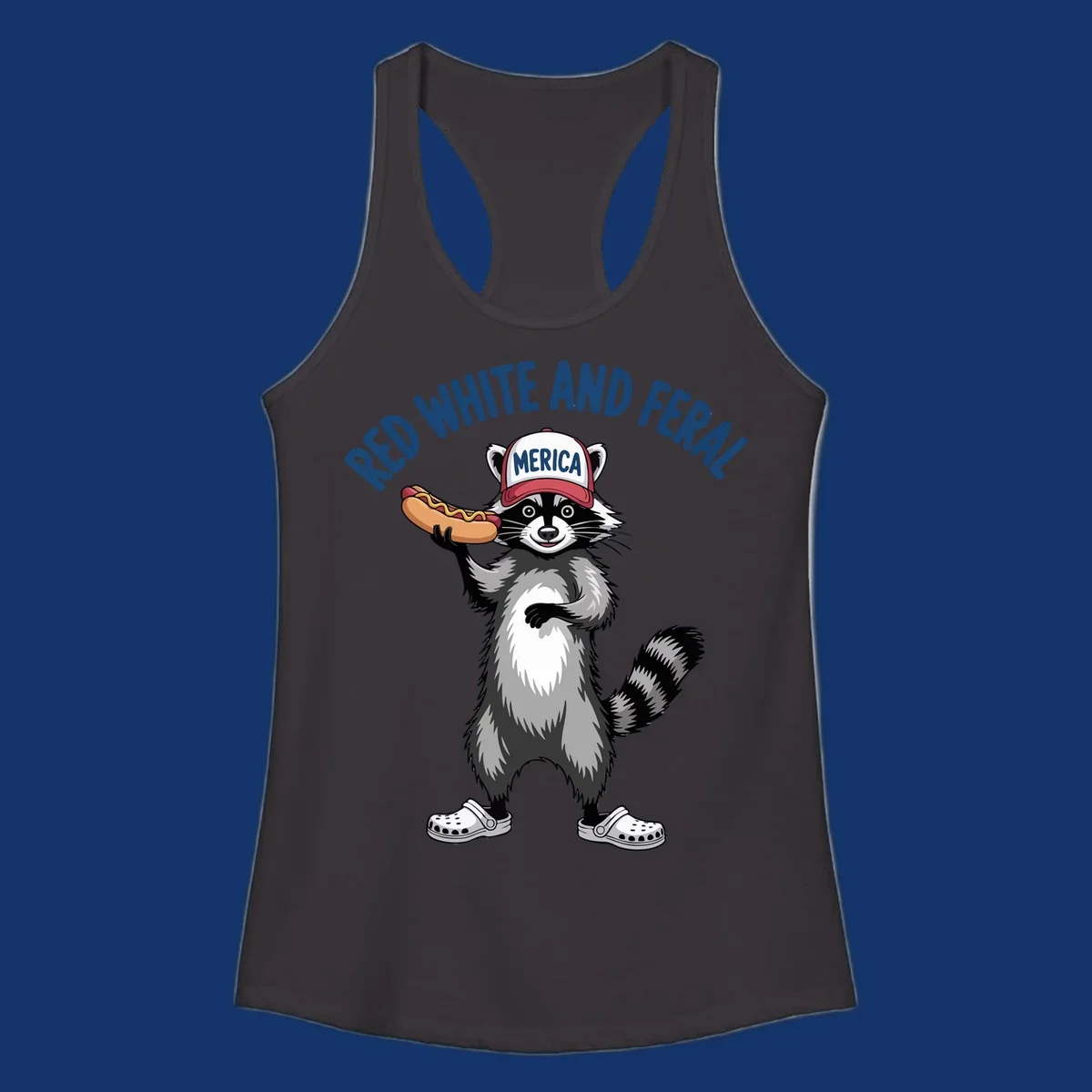 A patriotic raccoon in a MERICA hat and Crocs holds a hot dog, with 'RED WHITE AND FERAL' text. Features the red-white-feral-raccoon concept.