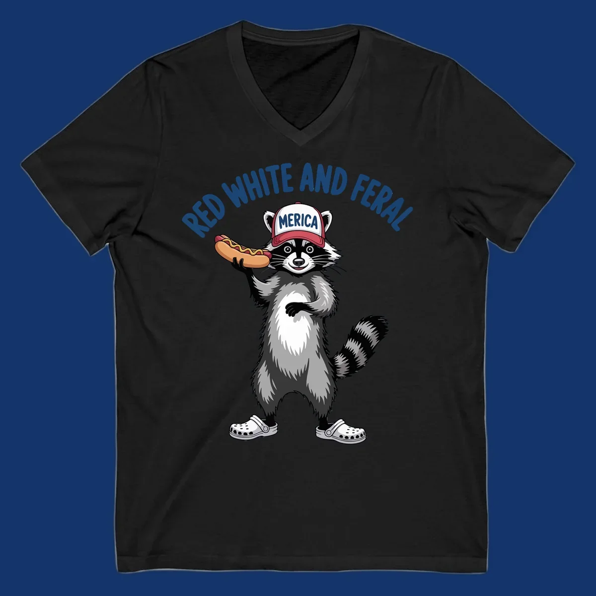 A patriotic raccoon in a MERICA hat and Crocs holds a hot dog, with 'RED WHITE AND FERAL' text. Features the red-white-feral-raccoon concept.