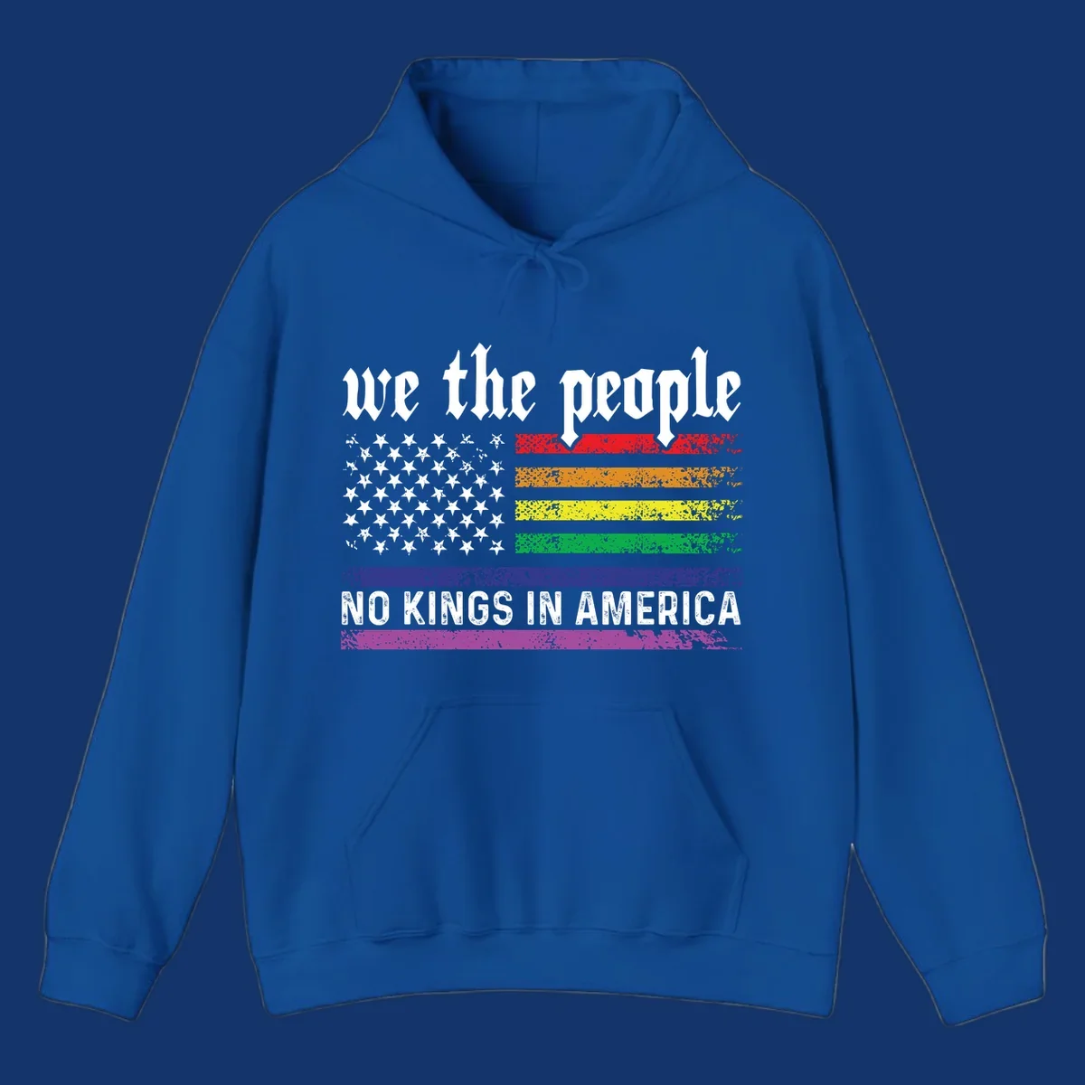 A distressed American flag with rainbow stripes and white stars, featuring 'we the people' and 'NO KINGS IN AMERICA' text.