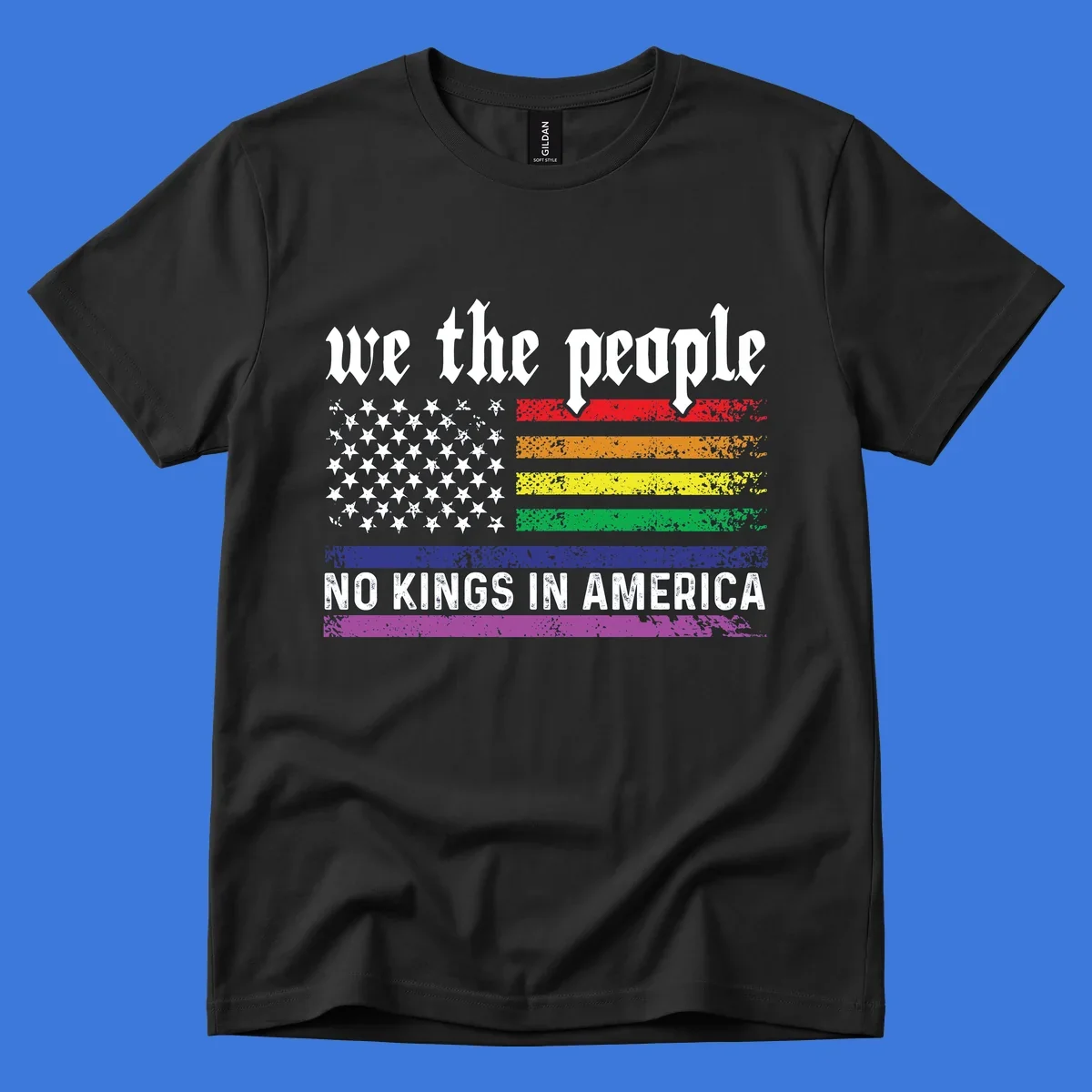 A distressed American flag with rainbow stripes and white stars, featuring 'we the people' and 'NO KINGS IN AMERICA' text.
