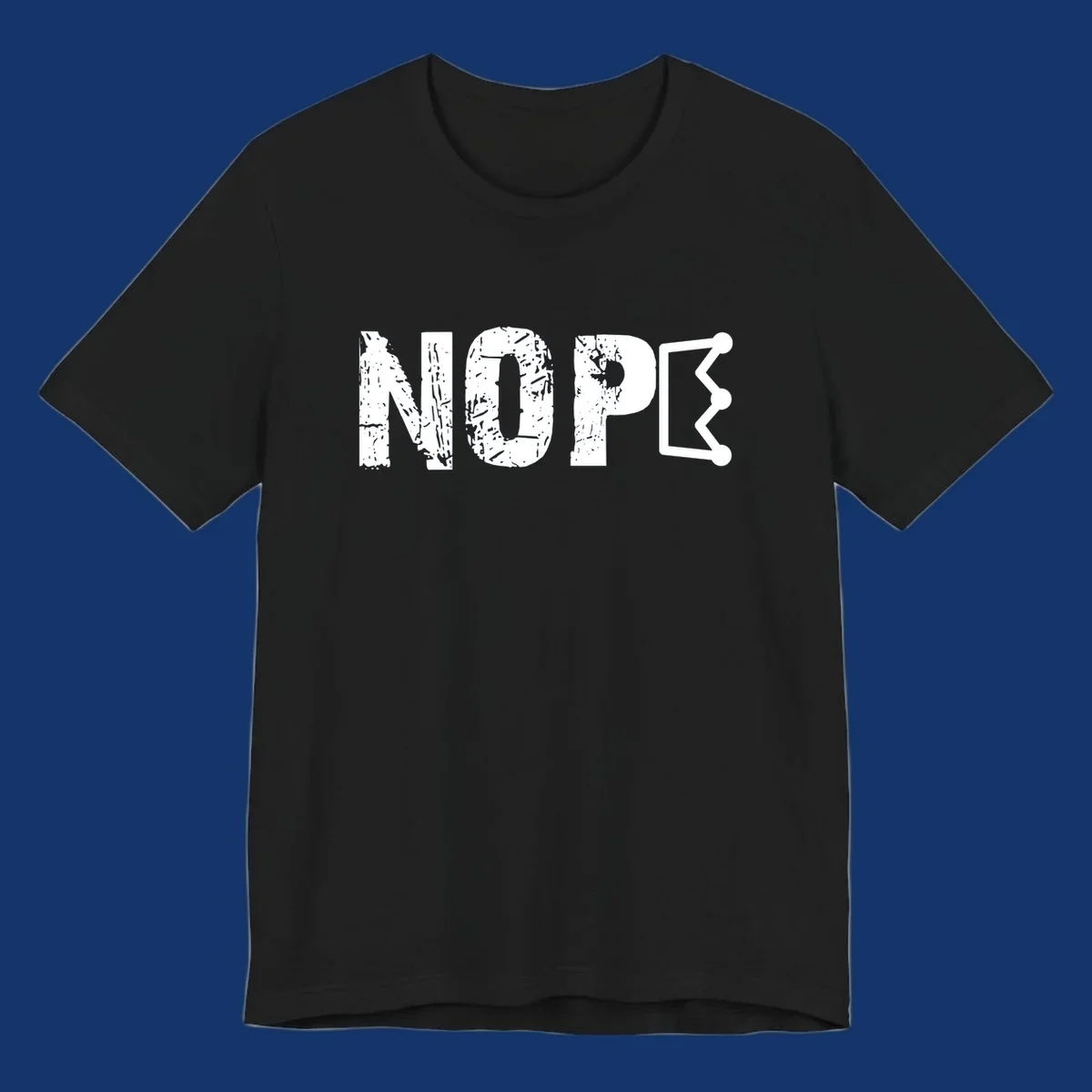 A distressed 'NOPE' text design where the 'E' is a crown outline, clean on all garment colors.