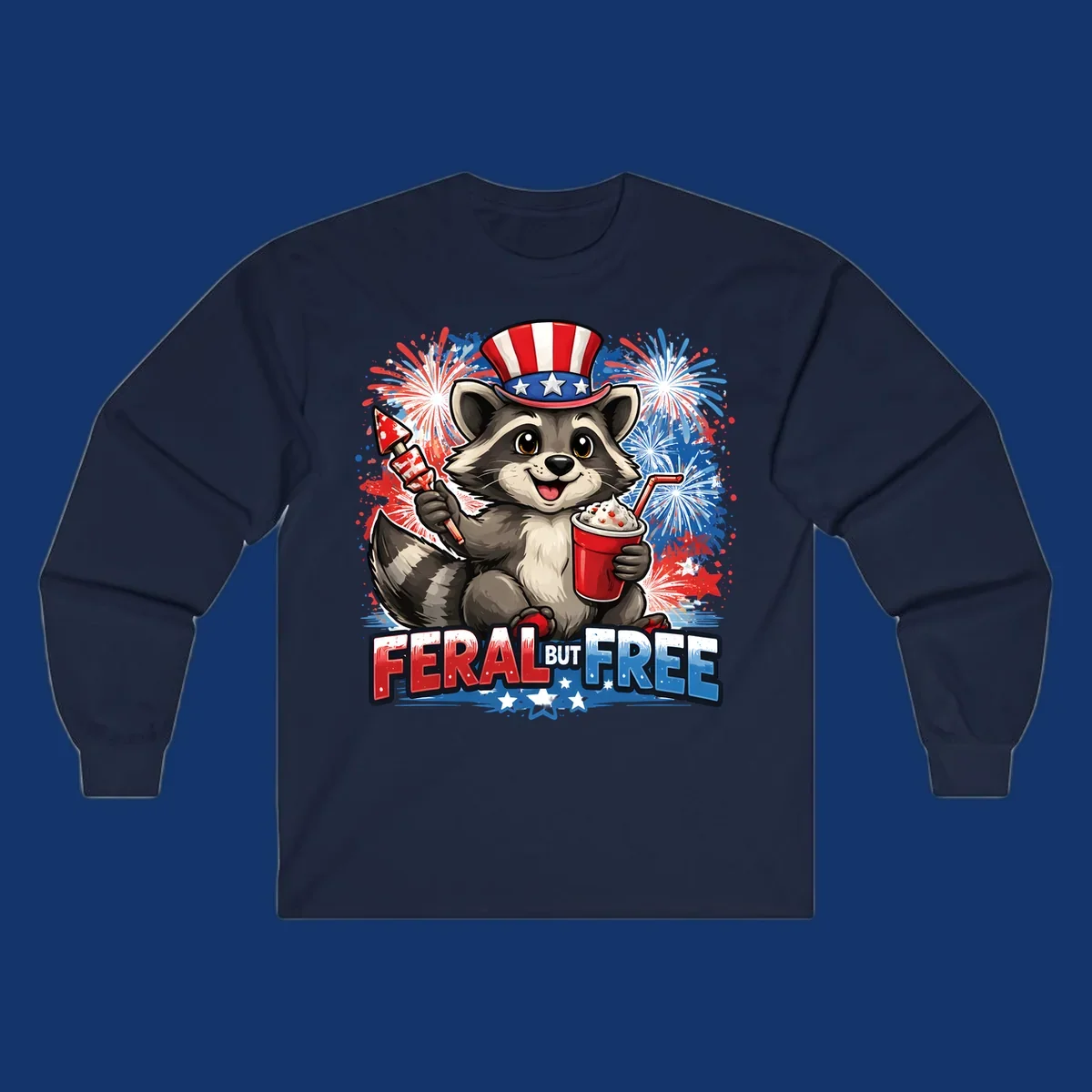 A cartoon raccoon in an Uncle Sam hat holds a firework and drink, with red, white, and blue fireworks and "FERAL BUT FREE" text.