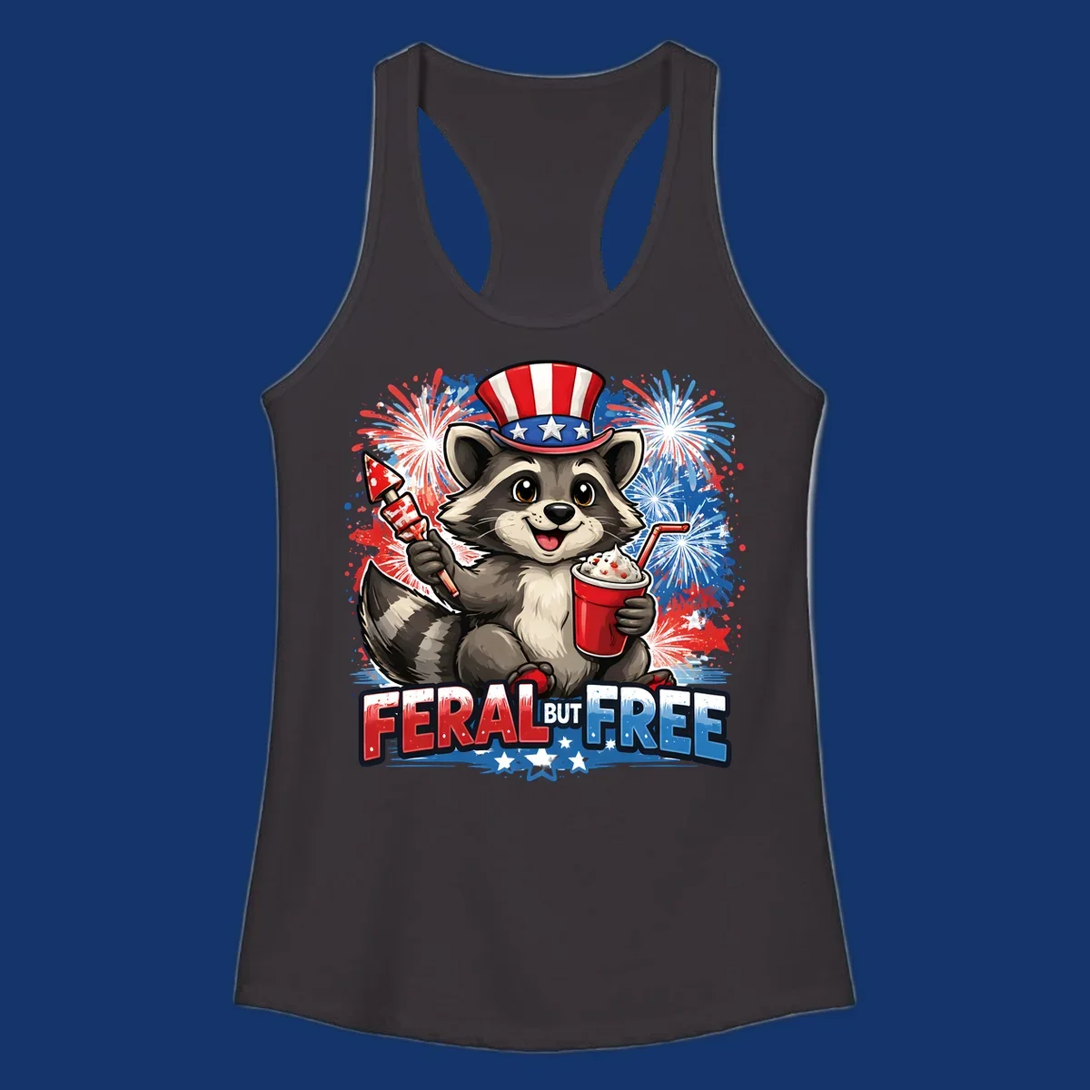 A cartoon raccoon in an Uncle Sam hat holds a firework and drink, with red, white, and blue fireworks and "FERAL BUT FREE" text.