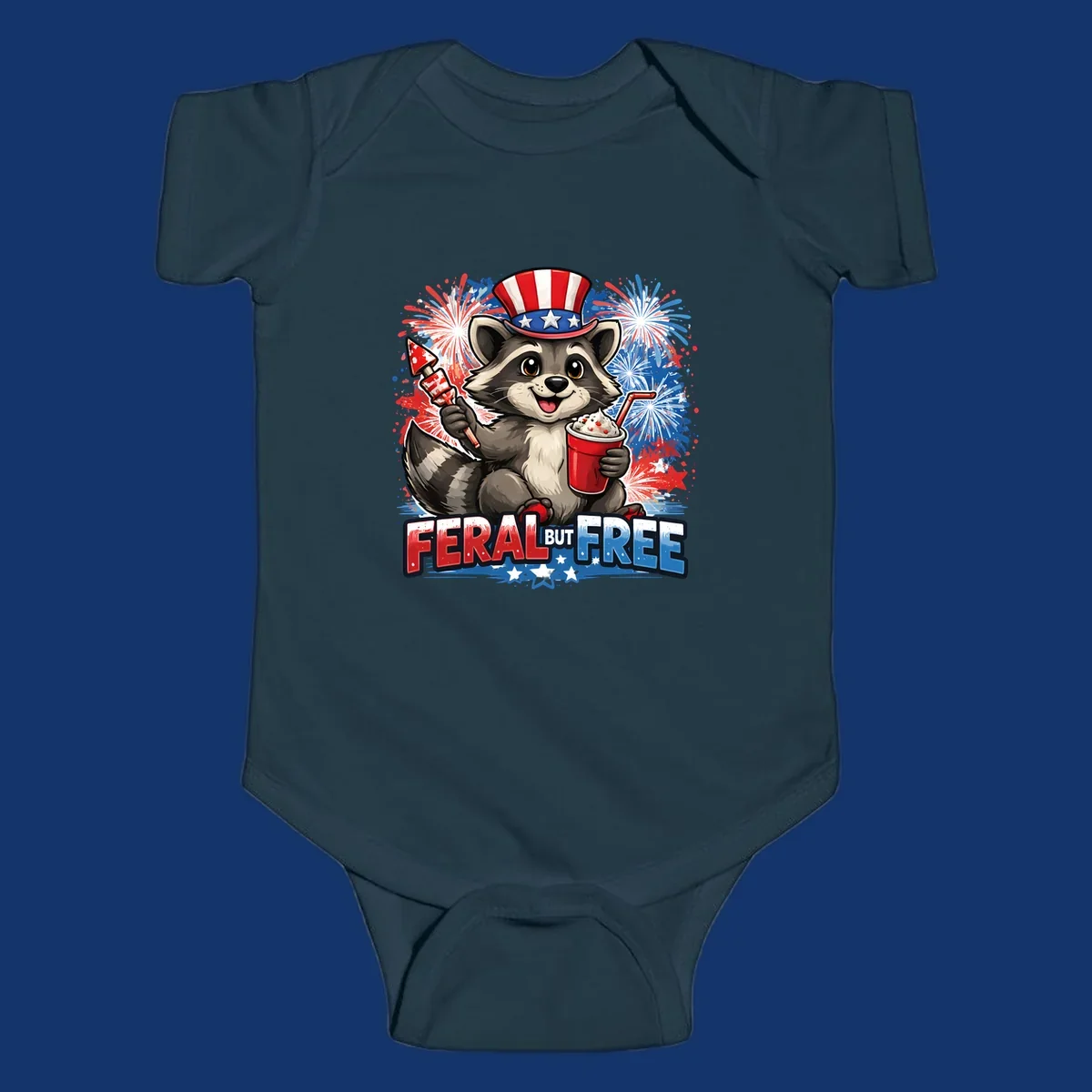 A cartoon raccoon in an Uncle Sam hat holds a firework and drink, with red, white, and blue fireworks and "FERAL BUT FREE" text.