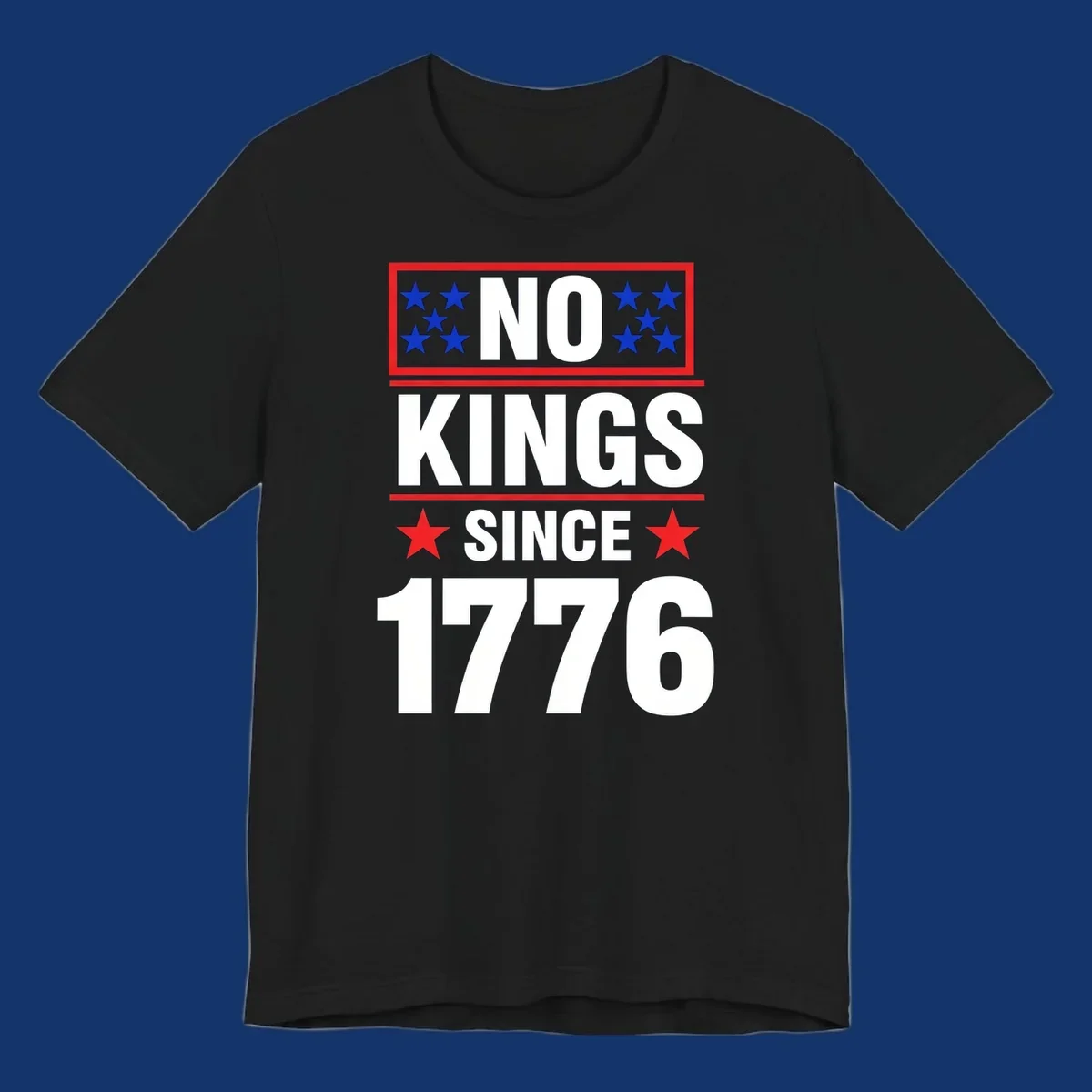 A patriotic design with the text 'NO KINGS SINCE 1776' in white and navy, featuring blue and red stars.
