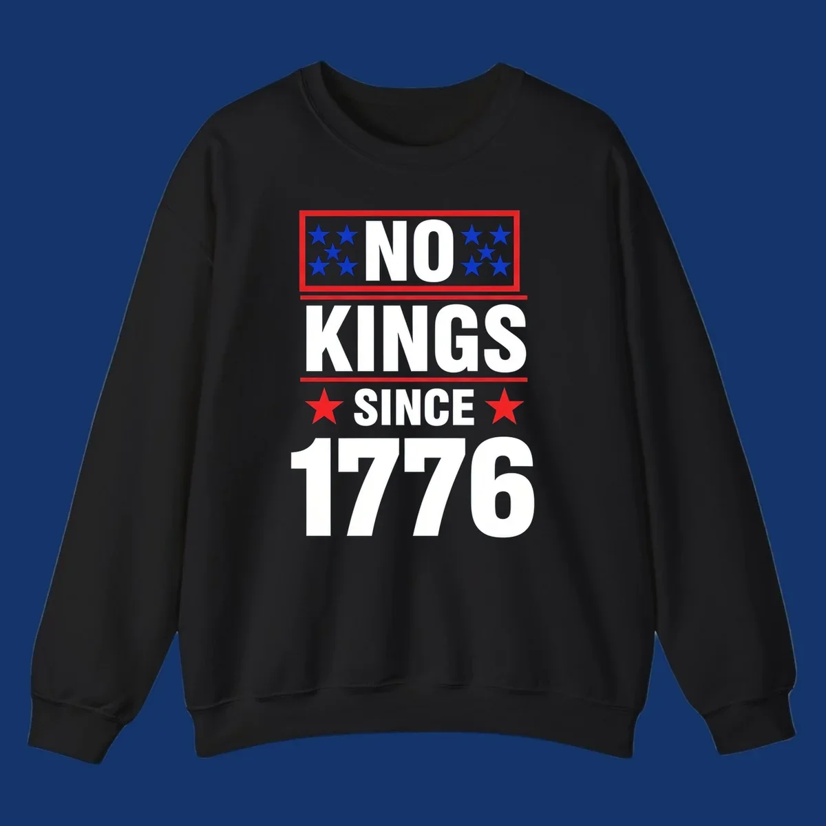 A patriotic design with the text 'NO KINGS SINCE 1776' in white and navy, featuring blue and red stars.