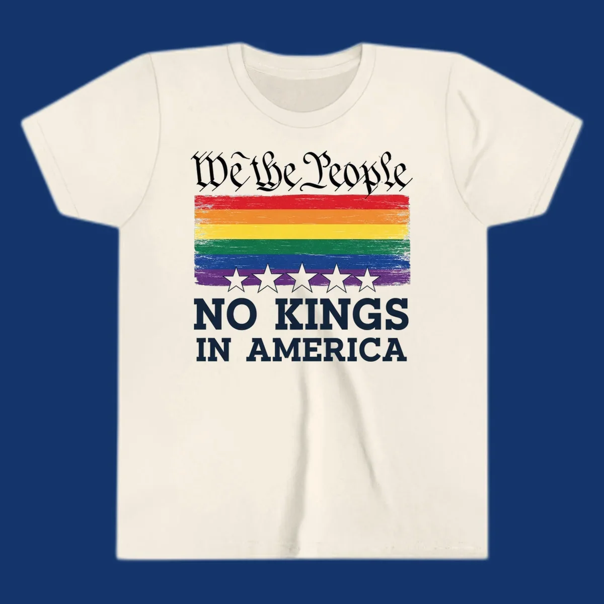 A distressed rainbow flag with five stars, 'We the People' above and 'NO KINGS IN AMERICA' below, symbolizing we-the-people-no-kings-pride.