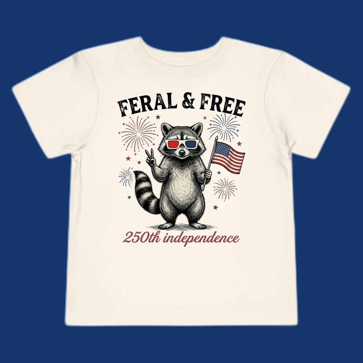 An illustrated raccoon in 3D glasses with an American flag and fireworks, text says 'Feral & Free 250th independence'.