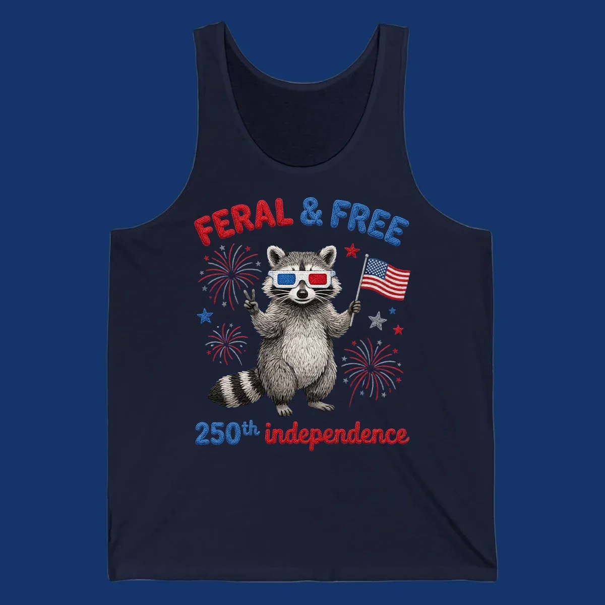 A playful raccoon in 3D glasses holds an American flag, surrounded by fireworks and stars, with "FERAL & FREE 250th independence".