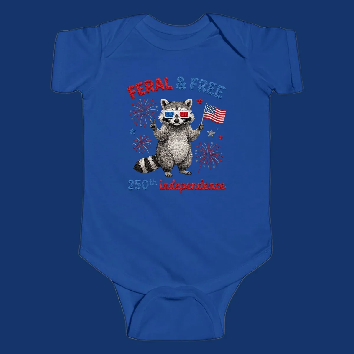 A "FERAL & FREE" raccoon in 3D glasses holds an American flag, surrounded by fireworks, celebrating 250th independence.