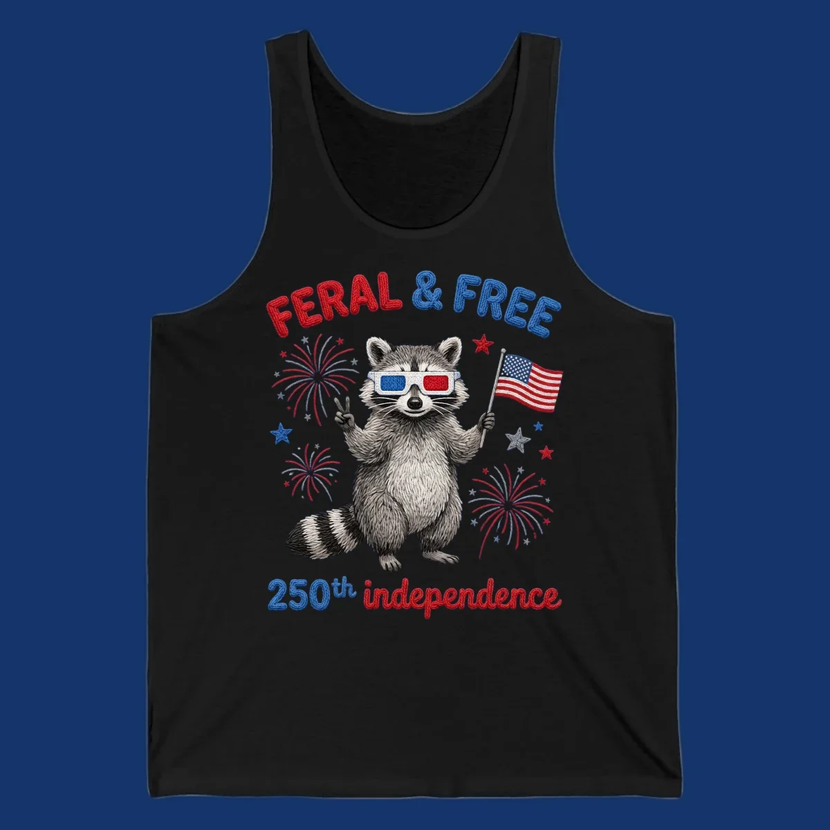 A "FERAL & FREE" raccoon in 3D glasses holds an American flag, surrounded by fireworks, celebrating 250th independence.