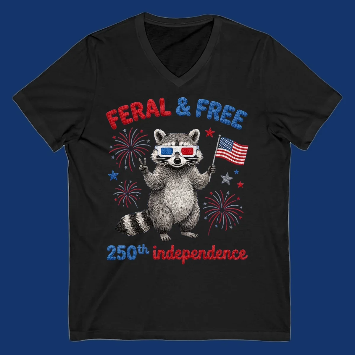 A "FERAL & FREE" raccoon in 3D glasses holds an American flag, surrounded by fireworks, celebrating 250th independence.