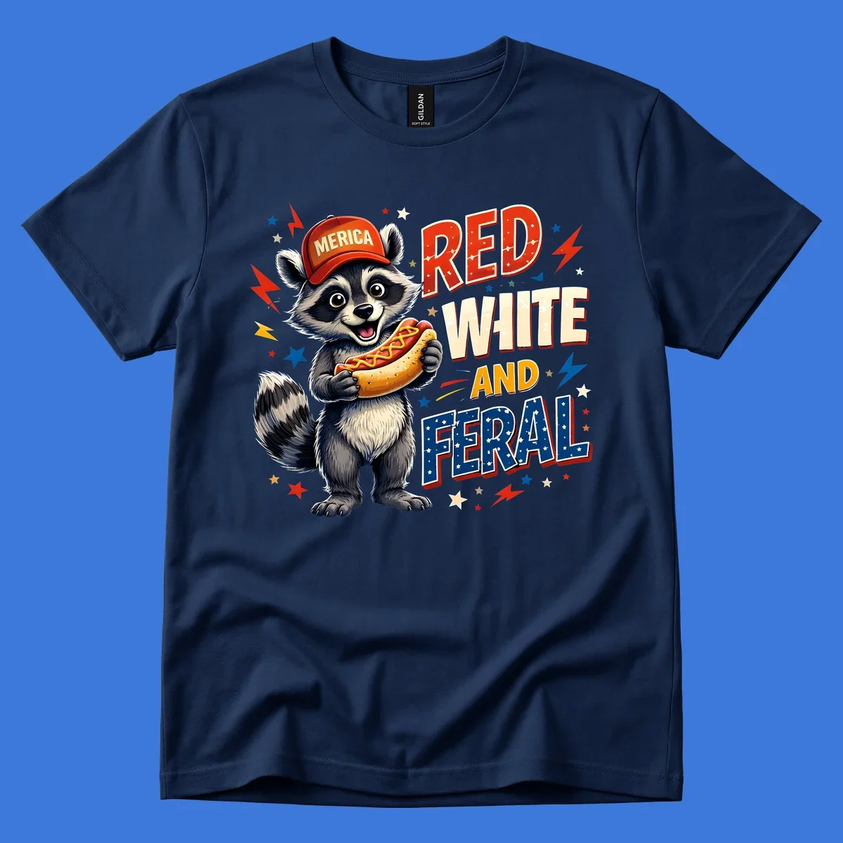 A happy raccoon in a 'MERICA' hat holds a hot dog, with 'RED WHITE AND FERAL' text, stars, and lightning bolts. Features a raccoon-merica-feral-hotdog theme.
