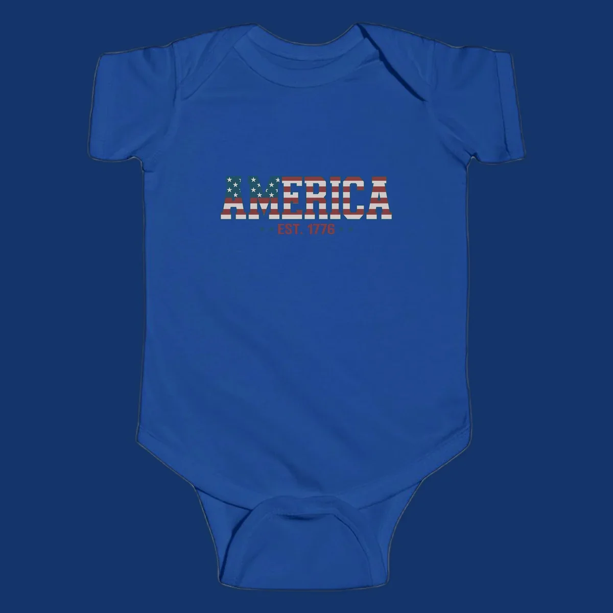 The word AMERICA in block letters, filled with an American flag pattern, above the text EST. 1776 with stars. Concept: america-est-1776-flag.