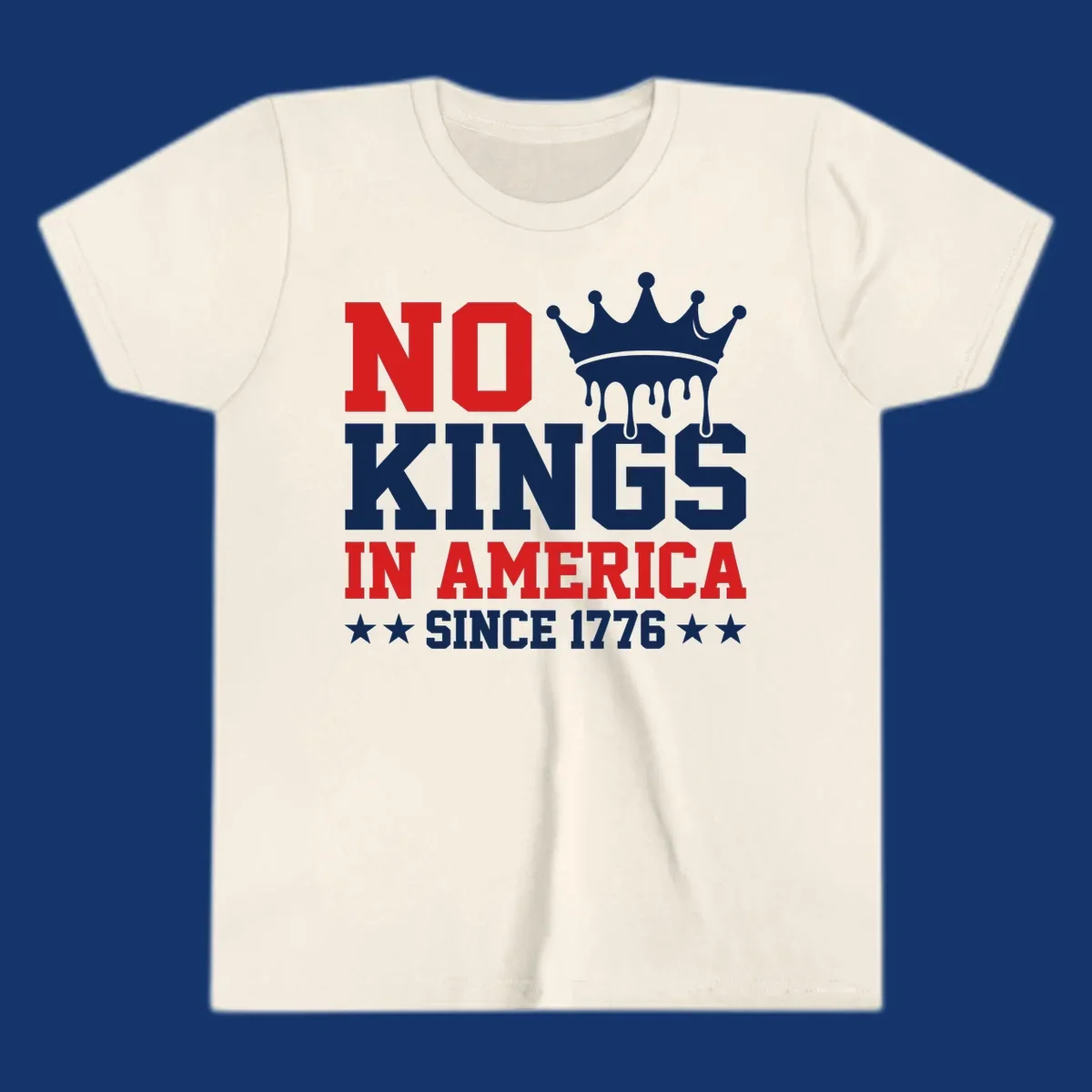 A patriotic design with text "NO KINGS IN AMERICA SINCE 1776" and a dripping blue crown, celebrating American independence.