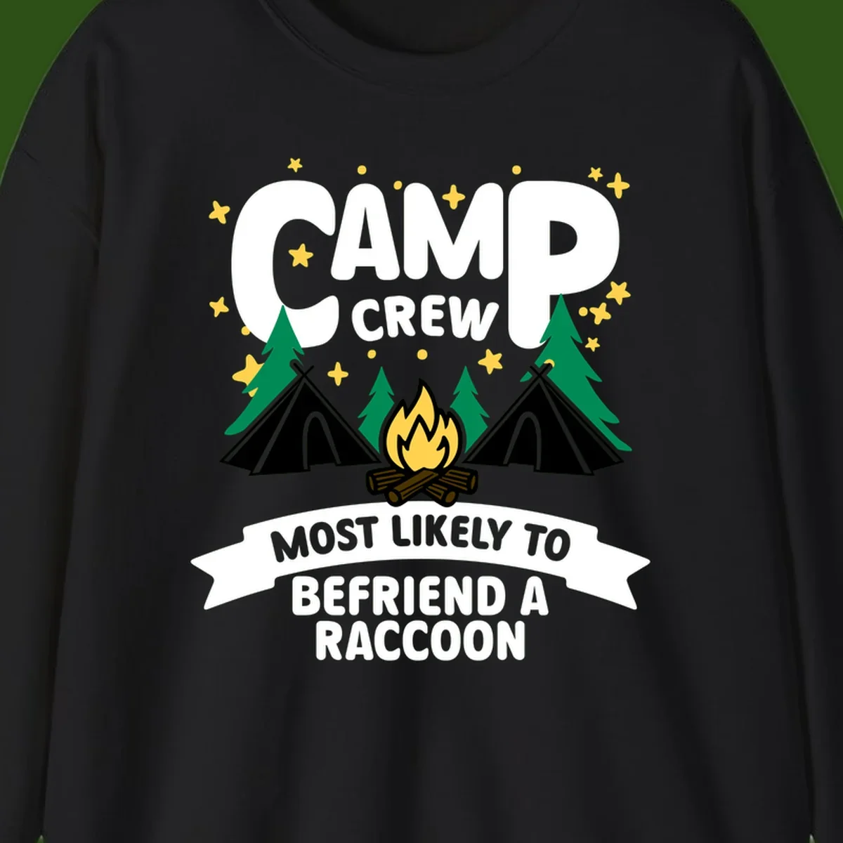 Camp crew raccoon design: campfire with teepees and trees, text reads 'Most Likely To Befriend A Raccoon'