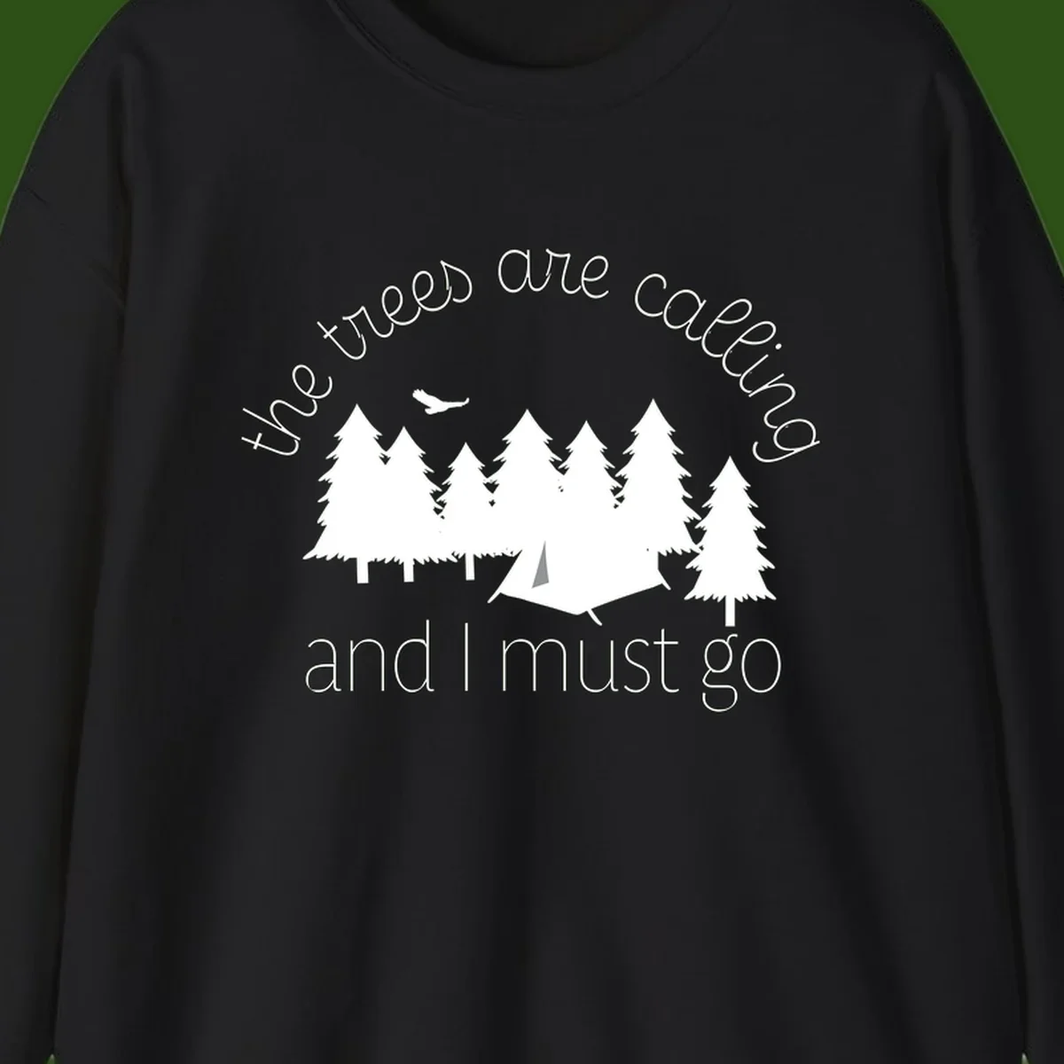 Minimalist camping design with evergreen trees, tent, and airplane with text 'The trees are calling and I must go'