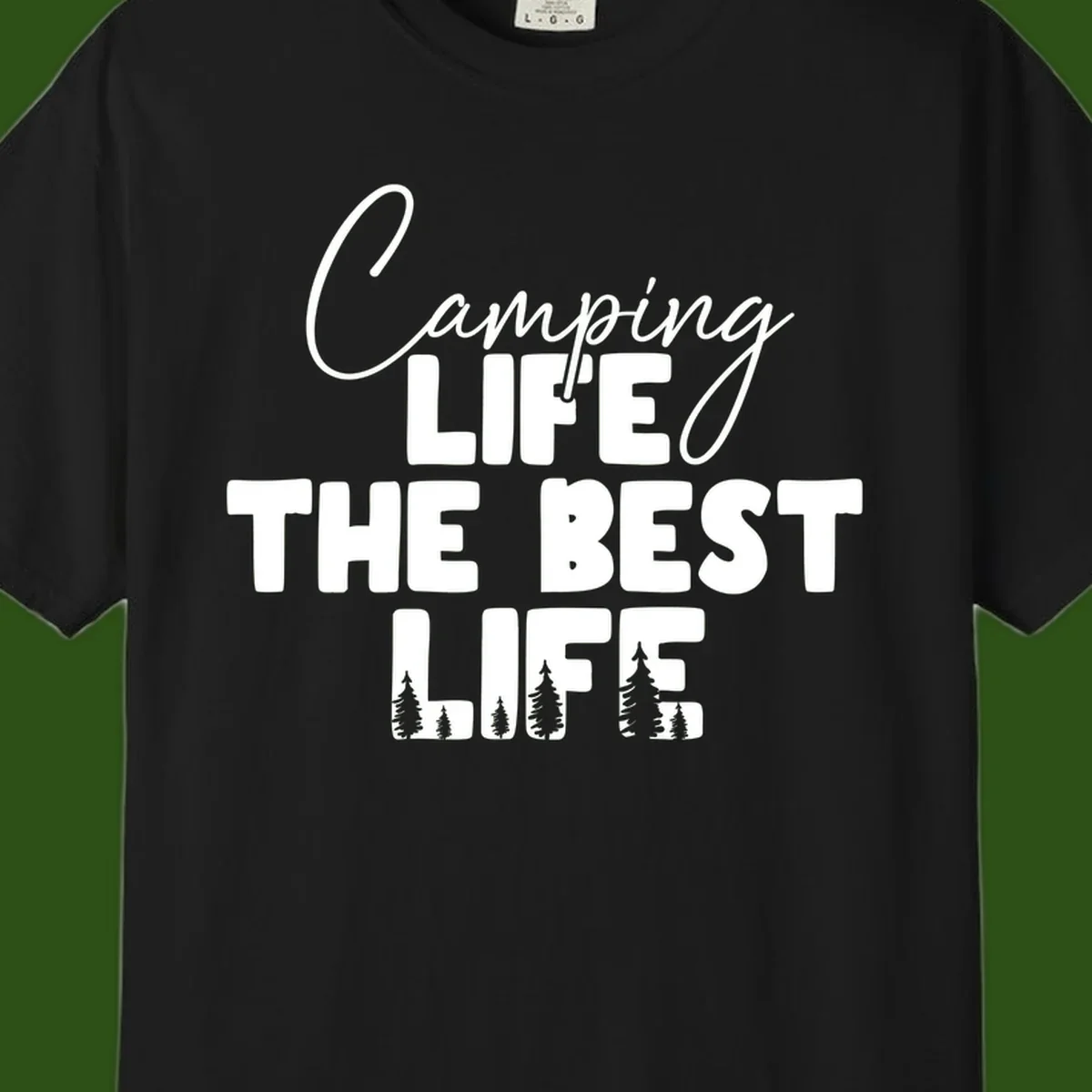 White text design reading 'Camping LIFE THE BEST LIFE' with pine tree silhouettes on gray background