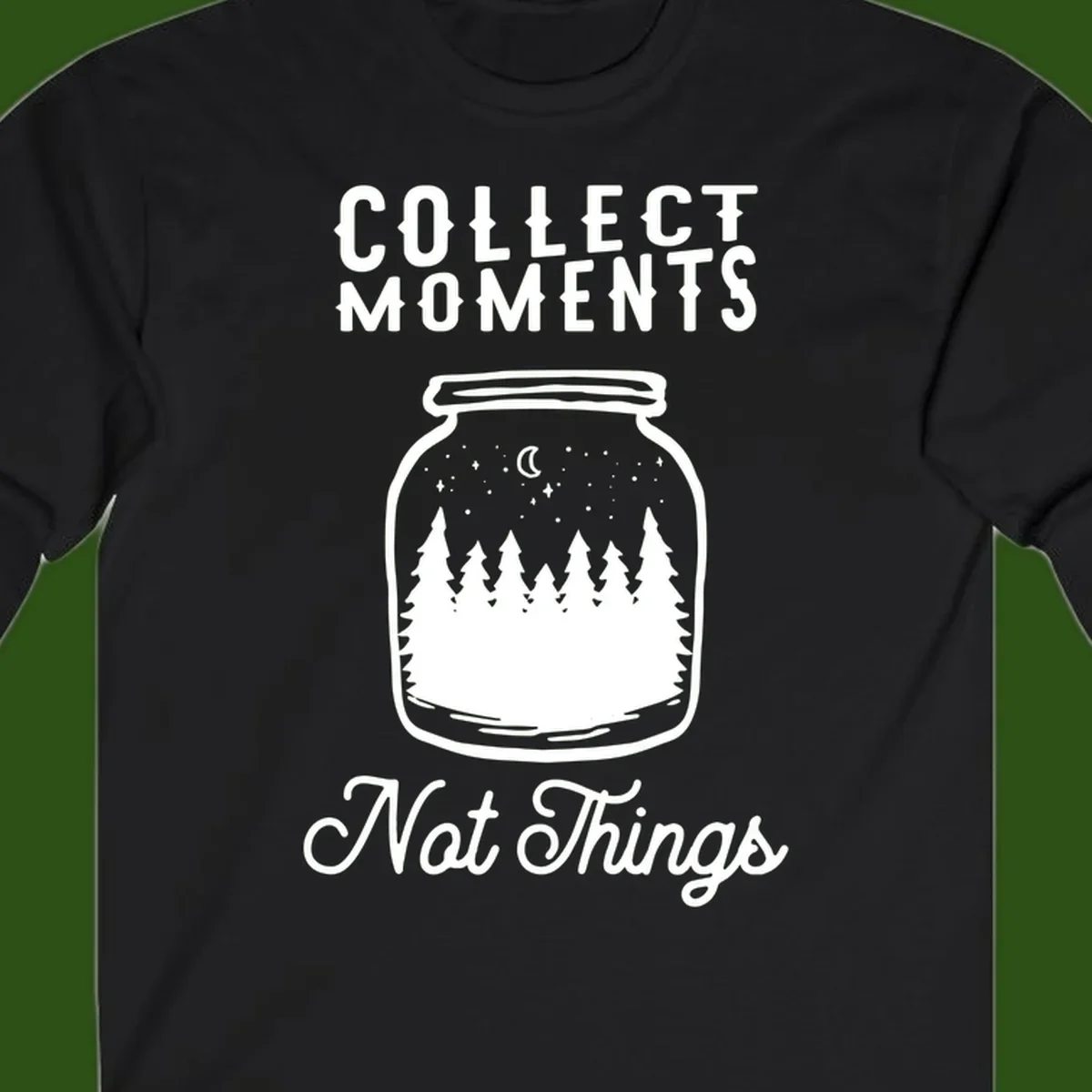 White illustrated mason jar filled with evergreen forest, moon, and stars with text 'Collect Moments Not Things' for camping enthusiasts