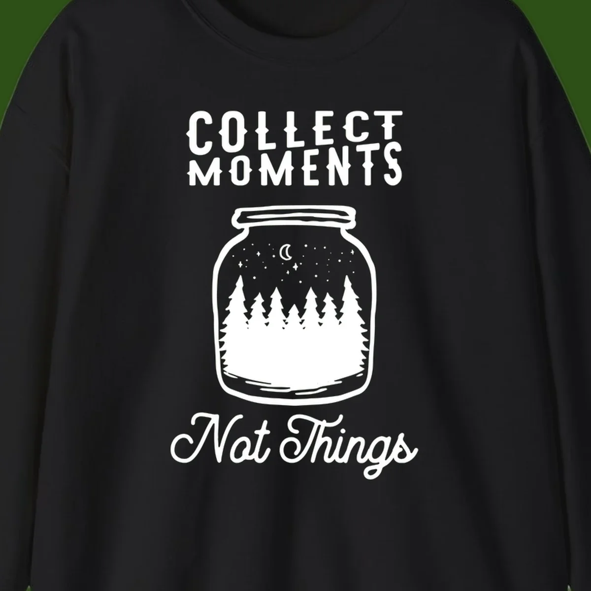 White illustrated mason jar filled with evergreen forest, moon, and stars with text 'Collect Moments Not Things' for camping enthusiasts