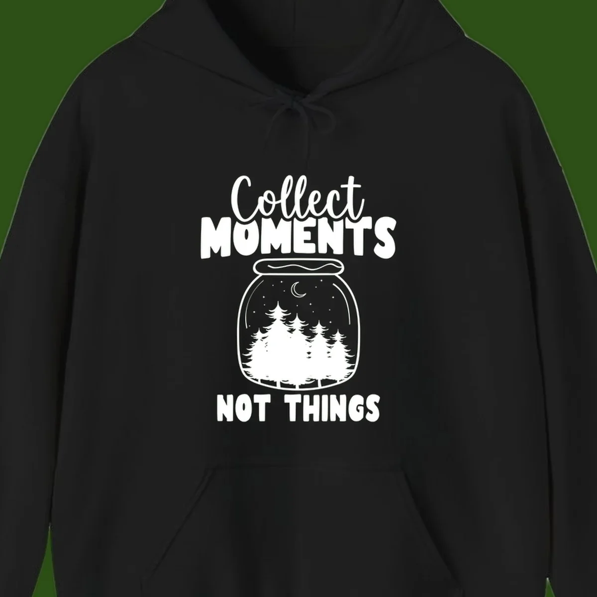 Illustration of a mason jar containing a nighttime forest scene with trees, moon, and stars, with text reading 'Collect Moments Not Things'