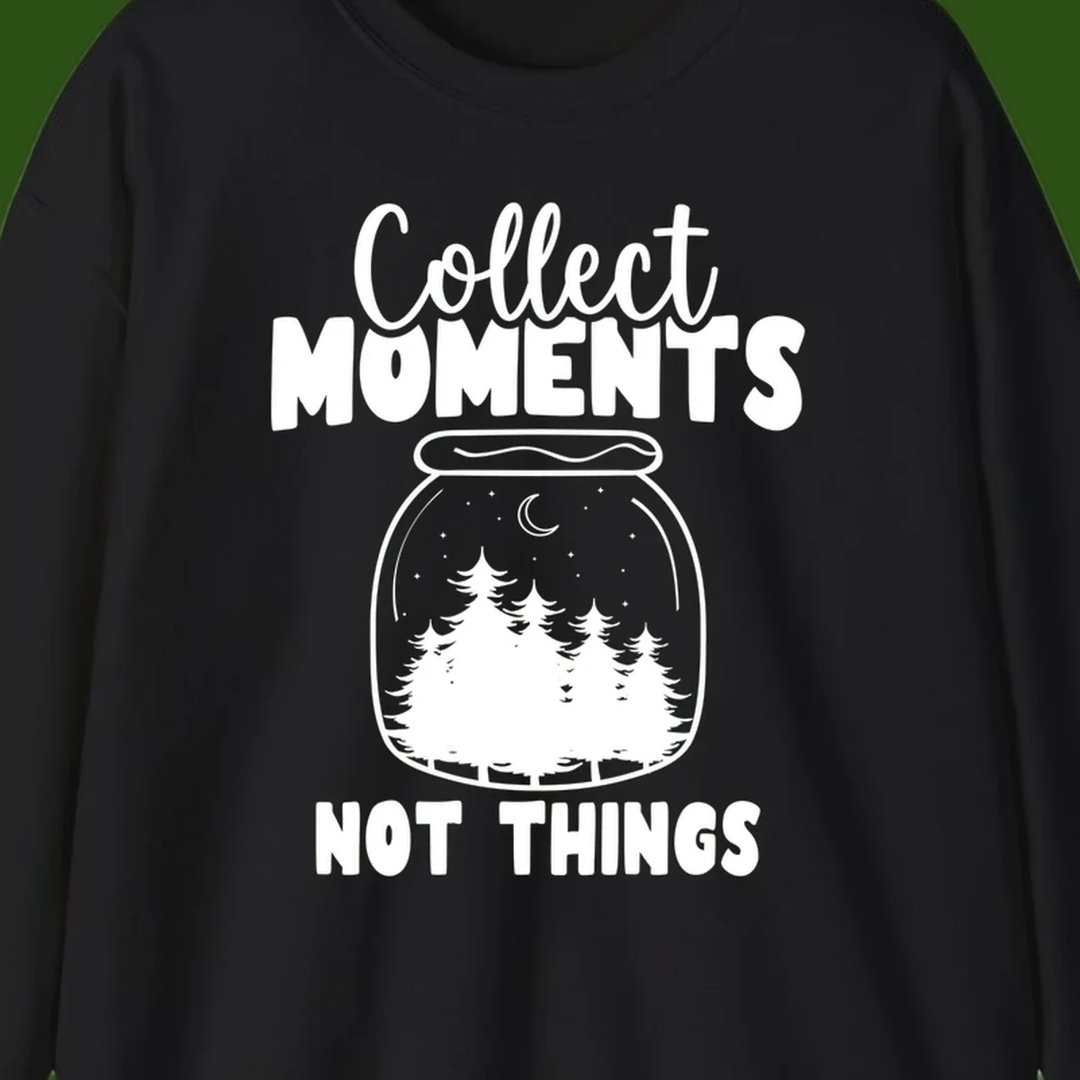 Illustration of a mason jar containing a nighttime forest scene with trees, moon, and stars, with text reading 'Collect Moments Not Things'