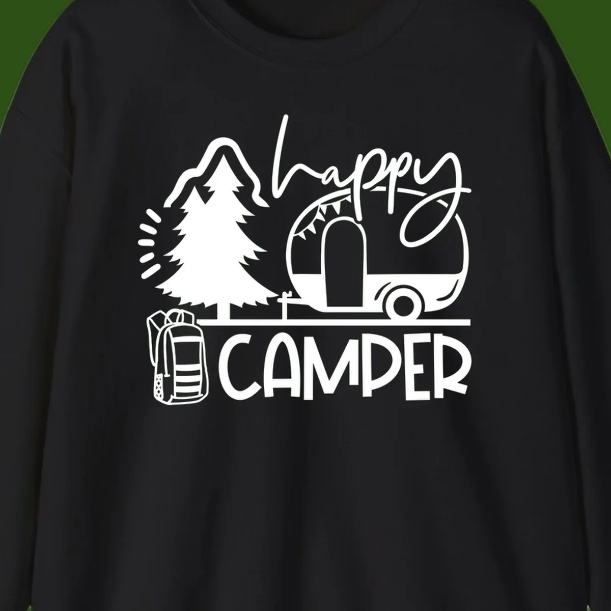 Happy Camper design with evergreen tree, vintage teardrop trailer, backpack, and radiating light rays in white on gray background.