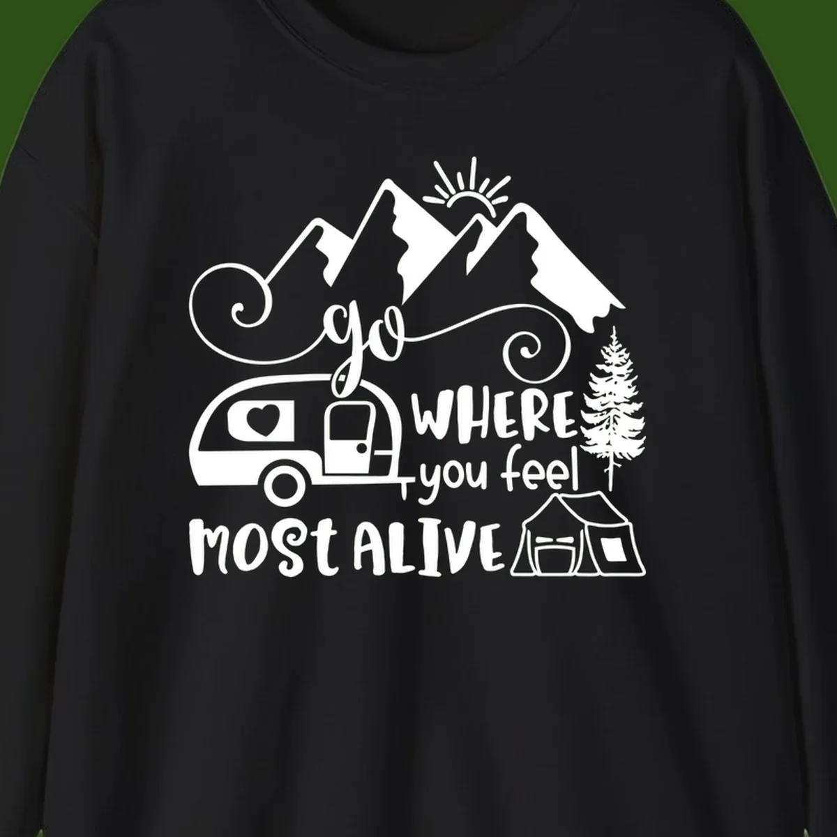 Line art design with mountains, camper van, tent and pine tree with text 'go where you feel most alive' celebrating nomadic camping lifestyle